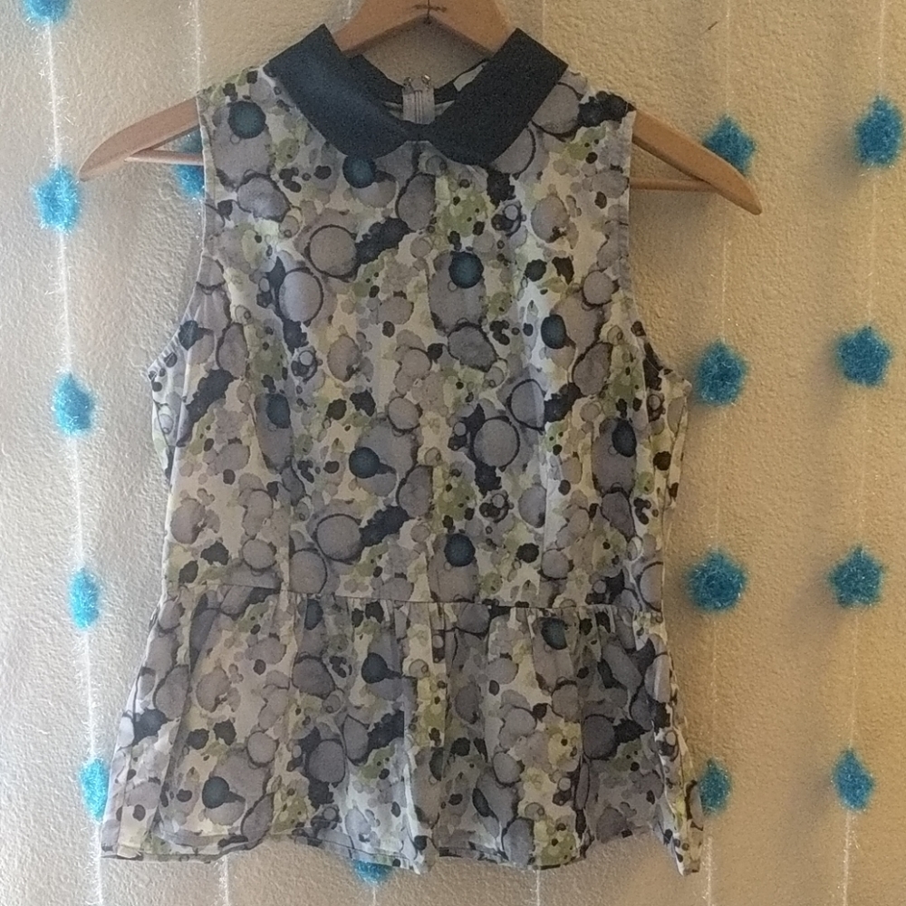 Lovely little peplum tank with peter pan collar